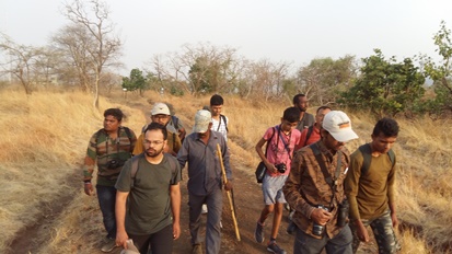 Naturalists trekking
